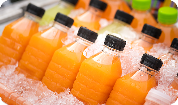 Orange Juice Bottles On Ice