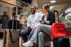 Travel Couple With Luggage